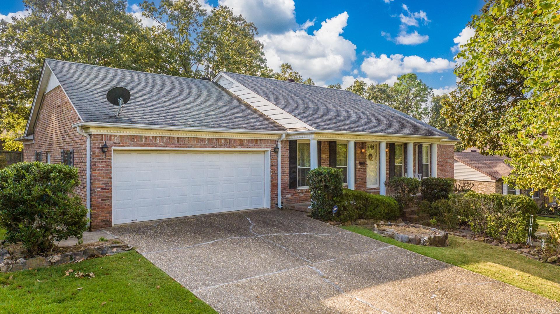 Great family home... ready for your updates and personal touch. The main level has a formal dining/living area, a family room with a fireplace and vaulted ceiling. The kitchen has great working space with an island, pantry and kitchen table area with lots of light. The laundry room is large enough for extra storage and a second refrigerator. Three bedrooms and two full baths on the main floor; the guest bath has two vanities. There is access to a heated and cooled 410 square foot basement from inside the house, down a spiral staircase. This square footage is included in the total square footage and the price has been adjusted accordingly. The basement has been finished out with a nice bar area, a full bathroom and a door to the backyard. This area provides great bonus space for entertaining or an additional bedroom if needed. The outdoor deck looks out over a large backyard. Seller is preparing for an estate sale.