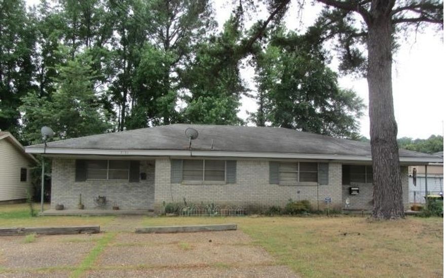 Brick duplex, 2 bed 1 bath each side. Occupants in both units. 10,800 annual income