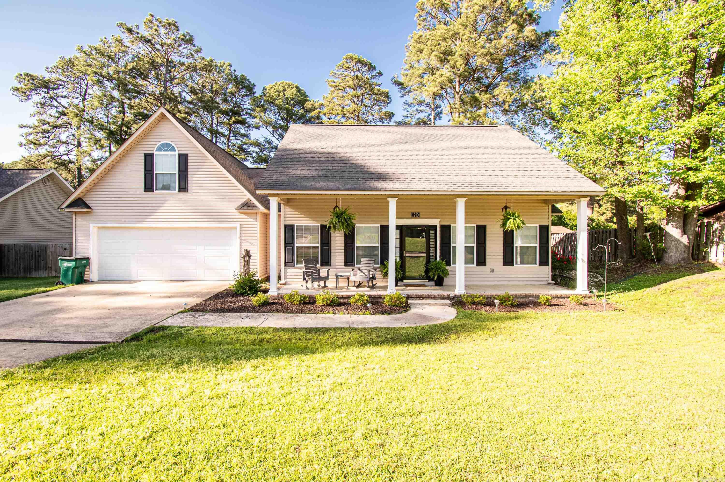 Welcome to your dream home in the sought-after Racquet Club neighborhood! This beautifully designed 4-bedroom, 3-bath home offers a perfect blend of elegance and comfort, setting a new standard for luxurious living. As you step inside, you will be greeted by a spacious open floor plan accentuated by soaring 9-foot ceilings and abundant natural light. The heart of the home features a chef's kitchen equipped with a large granite island, perfect for entertaining and meal preparation. Gorgeous granite countertops, sleek new light fixtures, and a walk-in pantry make this kitchen a culinary dream. The living area, complete with stunning hardwood floors, flows seamlessly from the kitchen, ideal for gatherings of all sizes. Relax and unwind in the expansive master suite, which boasts a recently updated bathroom that offers both style and function. Additional highlights include: A sizable 10x12 storage building for all your extra belongings. A charming fenced backyard that provides a private and peaceful outdoor retreat. A convenient upstairs loft that includes a white storage cabinet for additional organization. This home is not just a place to live but a haven of comfort and style.