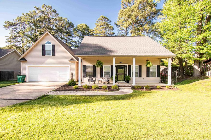 Welcome to your dream home in the sought-after Racquet Club neighborhood! This beautifully designed 4-bedroom, 3-bath home offers a perfect blend of elegance and comfort, setting a new standard for luxurious living.  As you step inside, you will be greeted by a spacious open floor plan accentuated by soaring 9-foot ceilings and abundant natural light. The heart of the home features a chef's kitchen equipped with a large granite island, perfect for entertaining and meal preparation. Gorgeous granite countertops, sleek new light fixtures, and a walk-in pantry make this kitchen a culinary dream.  The living area, complete with stunning hardwood floors, flows seamlessly from the kitchen, ideal for gatherings of all sizes. Relax and unwind in the expansive master suite, which boasts a recently updated bathroom that offers both style and function.  Additional highlights include:  A sizable 10x12 storage building for all your extra belongings. A charming fenced backyard that provides a private and peaceful outdoor retreat. A convenient upstairs loft that includes a white storage cabinet for additional organization. This home is not just a place to live but a haven of comfort and style.