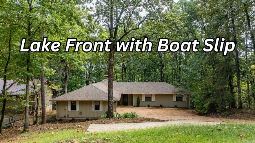 LAKEFRONT LIVING AT ITS FINEST! This beautifully remodeled 3-bedroom, 2-bath home offers the perfect blend of comfort, style, and functionality—all with stunning lakefront access and your very own private boat dock. Step inside to soaring vaulted ceilings and a cozy wood-burning fireplace, creating a warm and inviting living space. The kitchen comes equipped with a new refrigerator and microwave, while the home itself boasts a new heating and air system for peace of mind. The oversized garage and extra parking pad provide ample space for vehicles, toys, and guests. Outdoor living is just as impressive with a fire pit in the backyard, under-house storage, and a 6-foot-wide Army Corps–approved path leading directly to the water. The aluminum boat dock is equipped with a storage cabinet and a solar-powered boat lift, making lake days effortless. Additional updates include a 2-year-old water heater and roof ensuring this home is truly move-in ready. Whether you’re looking for a full-time residence or the perfect weekend retreat, this property delivers the ultimate lake lifestyle.