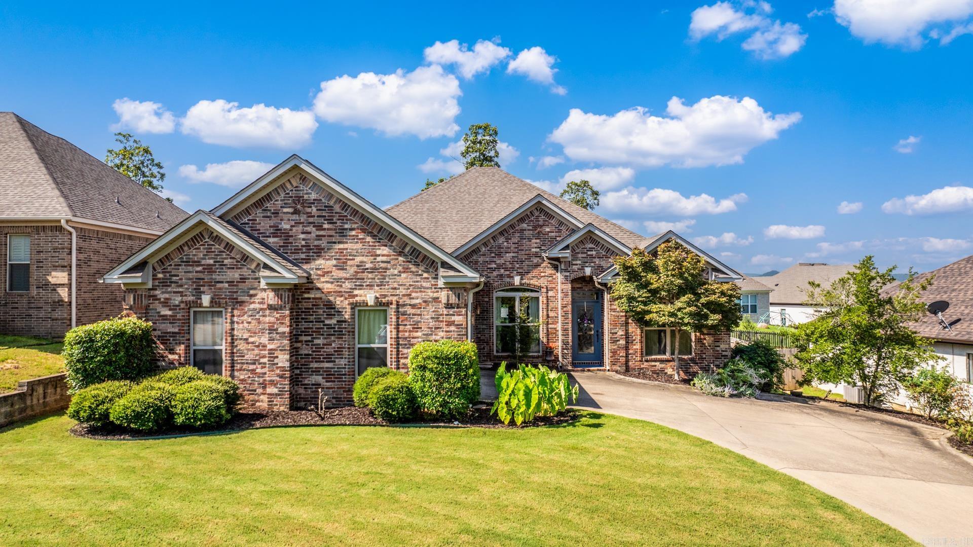 Welcome to this beautiful home located in the highly desired Maumelle Valley Estates. Offering 4 bedrooms and 2.5 bathrooms, this thoughtfully designed layout features a split-bedroom floor plan with the spacious primary suite situated privately on one side of the home. The open-concept kitchen flows seamlessly into the living room, creating the perfect space for everyday living and entertaining. Fully handicap accessible, this home ensures comfort and ease of mobility throughout. It also features newer HVAC units for improved efficiency and peace of mind. Step outside to a covered patio overlooking the backyard—ideal for relaxing or hosting guests. This is a rare opportunity to own a home that combines modern comfort, accessibility, and location. Don’t miss it!