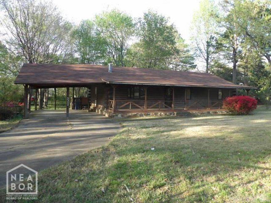 Rustic Log cabin in the city limits. Endless possibilities at the Harrisburg Road house. Open kitchen to dining area. Vaulted ceiling in the living area. Three bedrooms and two bathrooms with large closets. The front porch is perfect for rocking or sipping tea and slowing down a spell to enjoy the cool Spring nights as they roll in. See Agent Remarks