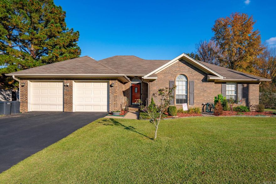 Move-In Ready in the Heart of Vilonia! This charming brick home sits on a spacious fenced lot with beautiful landscaping and plenty of room to enjoy the outdoors. Inside, you’ll love the easy-to-maintain luxury vinyl tile and tile flooring throughout—no carpet! The open living and dining area flows seamlessly into a spacious kitchen featuring stainless steel appliances and abundant cabinet space. The large primary suite offers comfort and privacy, while the backyard is perfect for entertaining with a covered patio overlooking the huge yard. Additional highlights include a storm shelter for peace of mind, a storage building, and a new water heater. Don’t miss this well-maintained home offering space, safety, and convenience all in one!