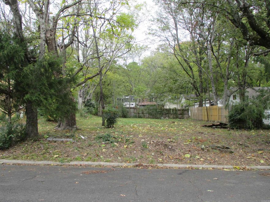 Nice Level lot is centrally located in town close to shopping etc. Utilities available at the street.  Footage from deed.