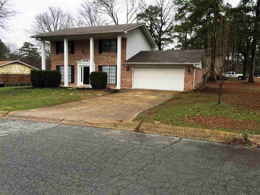 Here's a beautiful 1615 sq. ft., 2 story home sitting on a large corner lot in the Springhill Manor Subdivision.  This beautiful home has been totally remodeled & updated throughout.  This house has a new roof, new carpet, new tile, new hot water heater, new paint, marble counter tops, new lights & ceiling fans and all new stainless steel appliances in the kitchen (refrigerator, dishwasher, gas range and microwave.  The backyard is partially fenced with a covered patio.  See Remarks!