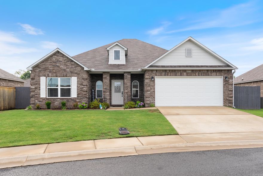 UPDATED & MOVE-IN READY! This IMMACULATE 4 bed, 2 bath home features the spacious Washington split floorplan, a perfect blend of functionality & style. Luxury vinyl plank (LVP) flooring in the kitchen, living room, hallways, bathrooms & laundry room is a modern touch throughout. The kitchen has staggered cabinets, NEWER backsplash & cabinet hardware. Stainless steel appliances & breakfast bar in the kitchen are a chef's delight! Lots of upgrades including LVP flooring in kitchen, living room, hallways, bathrooms & laundry room, staggered kitchen cabinets, soaking tub w/ shower, front door, additional outlets & oversized concrete patio. Updates in last 5 yrs - NEW backsplash & cabinet hardware in kitchen & throughout, crown molding in living room, kitchen, bedroom, 9 recessed lights added, custom fit blinds, ceiling fans in all bedrooms, upgraded shower heads in both bathrooms, bathroom towel & toilet paper holders, landscaping, back patio string lights & oasis, shop light and storage shelf in garage, and fresh interior paint in garage. Kitchen refrigerator, washer & dryer, blinds, alarm system & tv mounts included.  See agent remarks.