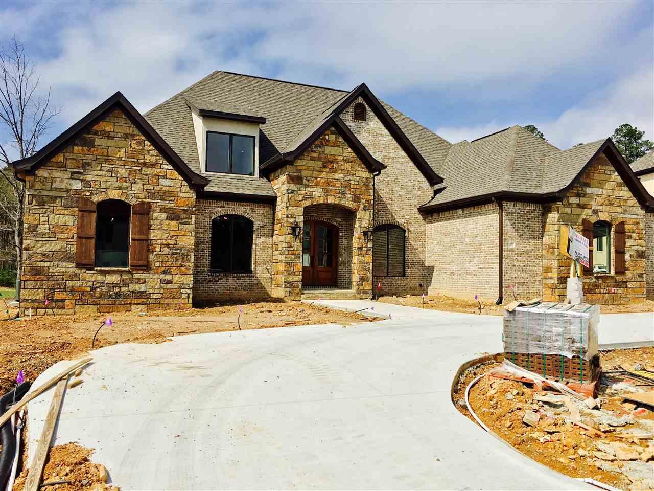 Magnificent NEW home located in the beautiful gated neighborhood of Orle'. This spacious floor plan features a large master bedroom, Huge walk in closet, guest bedroom and office all on the main level. The first floor also showcases an impressive kitchen along with 2 fireplaces and 2 living areas. There are 2 more bedrooms along with a bonus room and work out room upstairs. Outside you will find a 3rd fireplace alongside the large covered porch and sizable backyard. See attached sheet for more features.