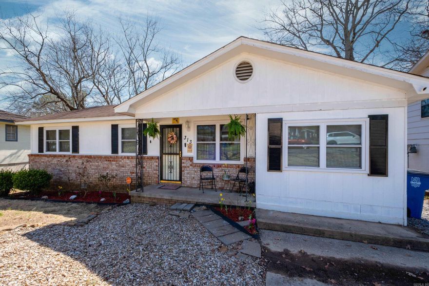 Looking for the suburban feel but still need to be close to everything?   Check out 313 Wisteria Lane in North Little Rock! ??  This home boasts 3 Bedrooms+Bonus with a full bath and ensuite half bath! The bonus room could be used as a shop, media room or extra bedroom.   The living room offers plenty of space for guests and the kitchen is spacious for all entertaining! Enjoy early mornings with coffee on your front porch or evenings grilling on your covered back porch!   The seller has made numerous improvements since owning from luxury vinyl plank flooring, backsplash, new paint and more! The front yard is manicured to perfection and the backyard is a landscaper's blank canvas!    With close proximity to Sherwood, North Little Rock and Downtown Little Rock! Less than 5 miles from elementary, middle and high schools. Close to shopping, dining and highway access!   Schedule your appointment today!
