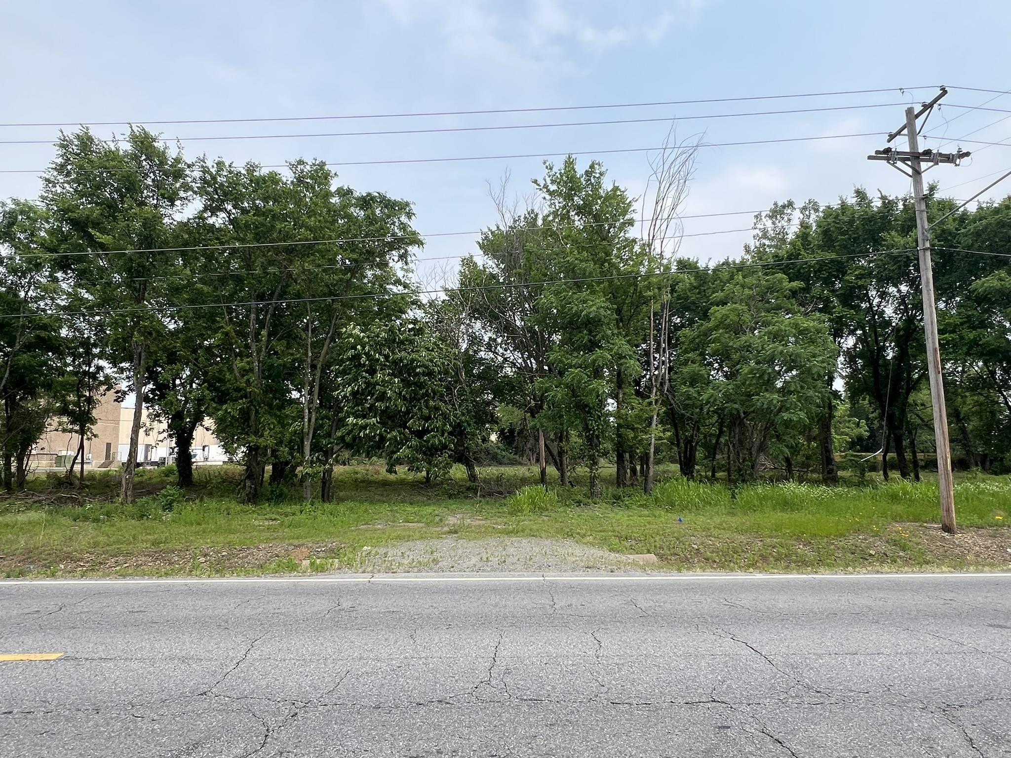 ZONING I-2. Property has been Partially cleared and has approximately 380 feet of frontage on the Blvd. Easy access to I-30 and I-40. All utilities to the site. Great location. Property surveyed in Feb. of 2023.