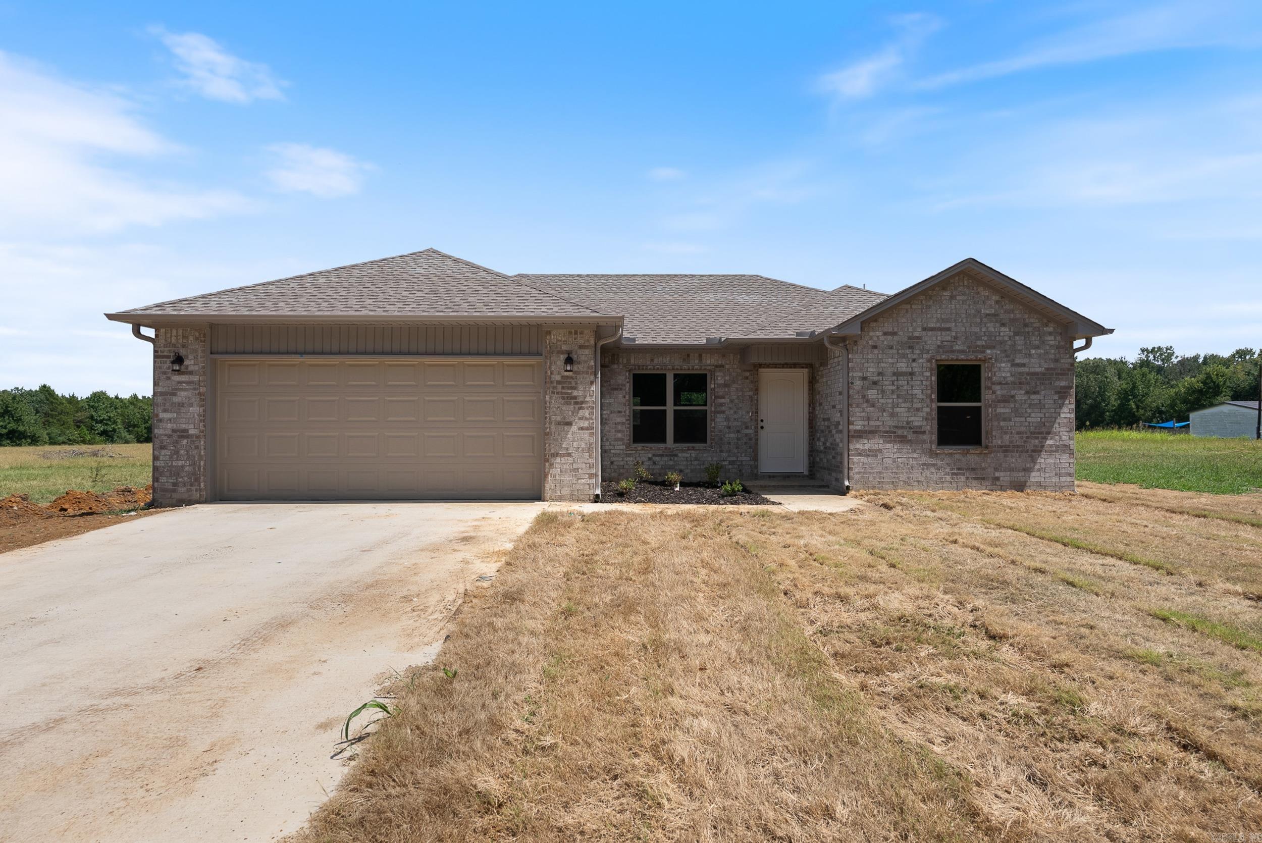 Welcome to this quality, new construction home built by Thomas Long Homes. This home features our Arkansas Plan - a fan favorite - with 3 bedrooms, 2 bathrooms, vaulted, open concept kitchen/dining/living, a great covered back porch, and a separate laundry room! This home is in an RD eligible area - so you could qualify for a $0 down payment loan! The interior features luxury vinyl plank floors throughout, tile shower in primary bath, granite countertops, and more! Minutes from I-57 and close to Highway 319, these homes are great for anyone working in Cabot, Beebe, Little Rock, Conway, or Searcy. We can't wait for you to make this your new home! Agents, please see remarks.