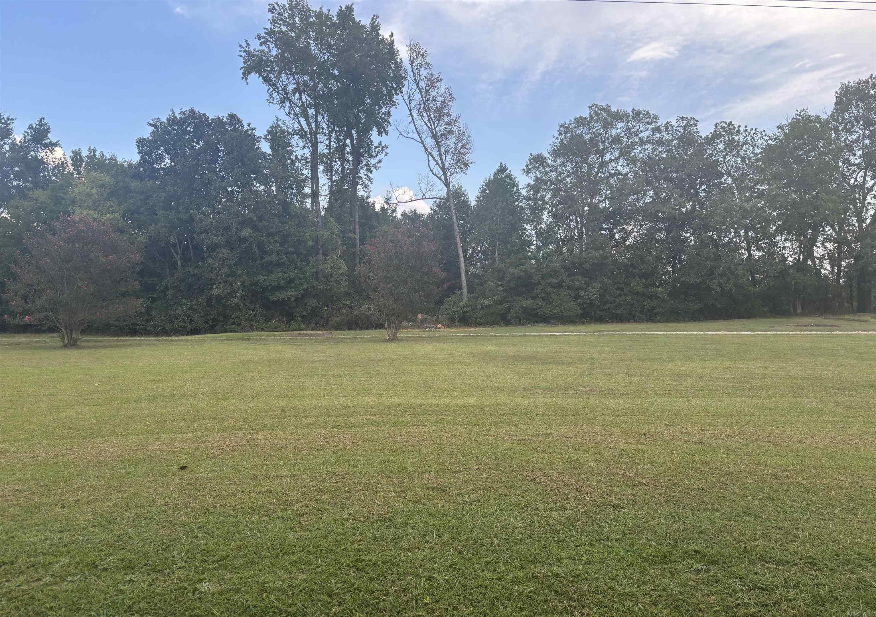 This 2.63 acres is cleared, has some privacy with woods behind it. Close to Bryant and Benton.