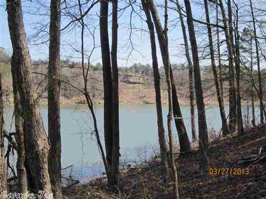 Bug out to your own lake front retreat. Remote 30 +/- acres of Greers Ferry lakefront. Play in the cave at the water's edge. If you love peace and quiet, then this is the place for you.  This much acreage on the lake is very rare. Lake views from rock bluffs and room to spare. Close to Hill Creek park and marina. Lots of hunting potential also. High clearance vehicle to access