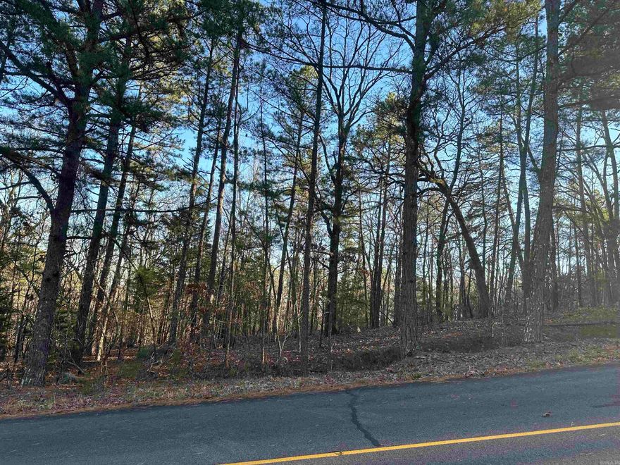 Vacant wooded lot with plenty of space to build your dream home! Central to HSV lakes, golf, trails, restaurants and more HSV amenities! Note to Buyers: there is a POA New Member Buy-In Fee required at closing.