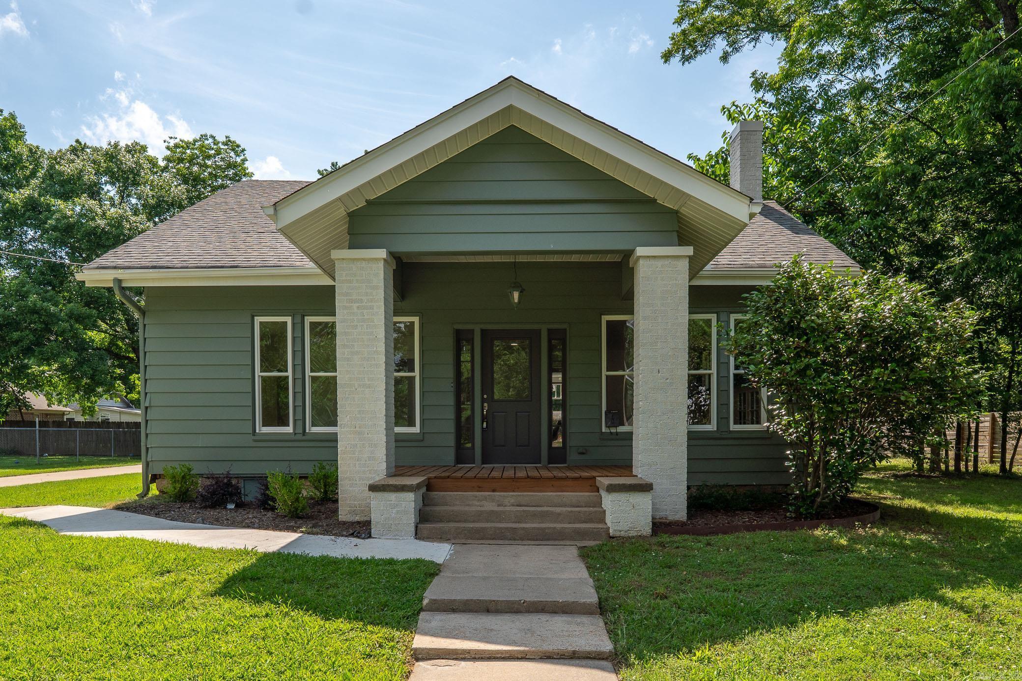 Welcome to this beautifully renovated Craftsman-style home, blending timeless character with modern comfort in Old Town Conway! Nestled on a quiet, tree-lined street, this 3-bedroom, 2-bath home features fresh exterior paint, classic horizontal lap siding, and a welcoming covered front porch perfect for relaxing mornings or evening gatherings. Step inside to discover an open and airy floor plan filled with natural light. The spacious living area showcases original architectural details alongside tasteful updates. The updated kitchen boasts quartz countertops, stainless steel appliances, and new cabinetry, ideal for both everyday living and entertaining. Retreat to the generously sized primary suite, complete with a private bath, custom tile shower and ample closet space. Outside, enjoy the landscaped yard, perfect for pets or gardening. Located just minutes from schools, shops, restaurants, and downtown amenities, this home offers the perfect combination of charm, style, and convenience. Donāt miss your chance to own this gem!
