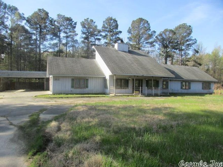 Large house designed for entertaining, sitting on a corner lot. Inground pool with privacy fence. Bedroom/ game room with bath upstairs with walkout balcony overlooking pool. Primary suite has large tub and sauna. Oversize 2 car garage and detached 2 car carport.  **AGENTS SEE REMARKS**