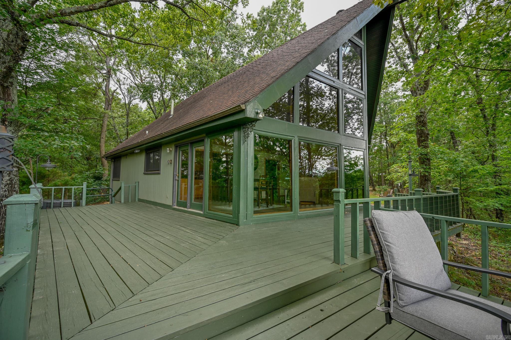 Looking for picturesque privacy with beautiful mountain views and a forest setting? Take a look at this INCREDIBLE, one of a kind 19 acre property! Situated on a serene dead end road, you’ll find this gorgeous A-Frame home overlooking a beautiful wooded valley. Step inside and notice floor to ceiling windows, high vaulted ceilings, a wood stove with stone chimney and an expansive wrap around porch to enjoy the tranquil surroundings. The home features an open concept kitchen complete with new stainless steel appliances, 3 bedrooms, 2 full baths, a laundry room, doggy door, and ample storage throughout! On site there is a recently renovated, well appointed guest house with a new washer dryer, electric fireplace and AC unit! Another incredible element to the property is the impressively constructed 50x30 shop that has been perfectly cared for by the current owners. Additional features include a gun range, ample fencing and gates for animals, and a convenient wrap around driveway. The property has been thoughtfully designed and includes some cleared pasture land, and many acres of forest. If you’re searching for a DREAM PROPERTY with close proximity to town, this could be it!