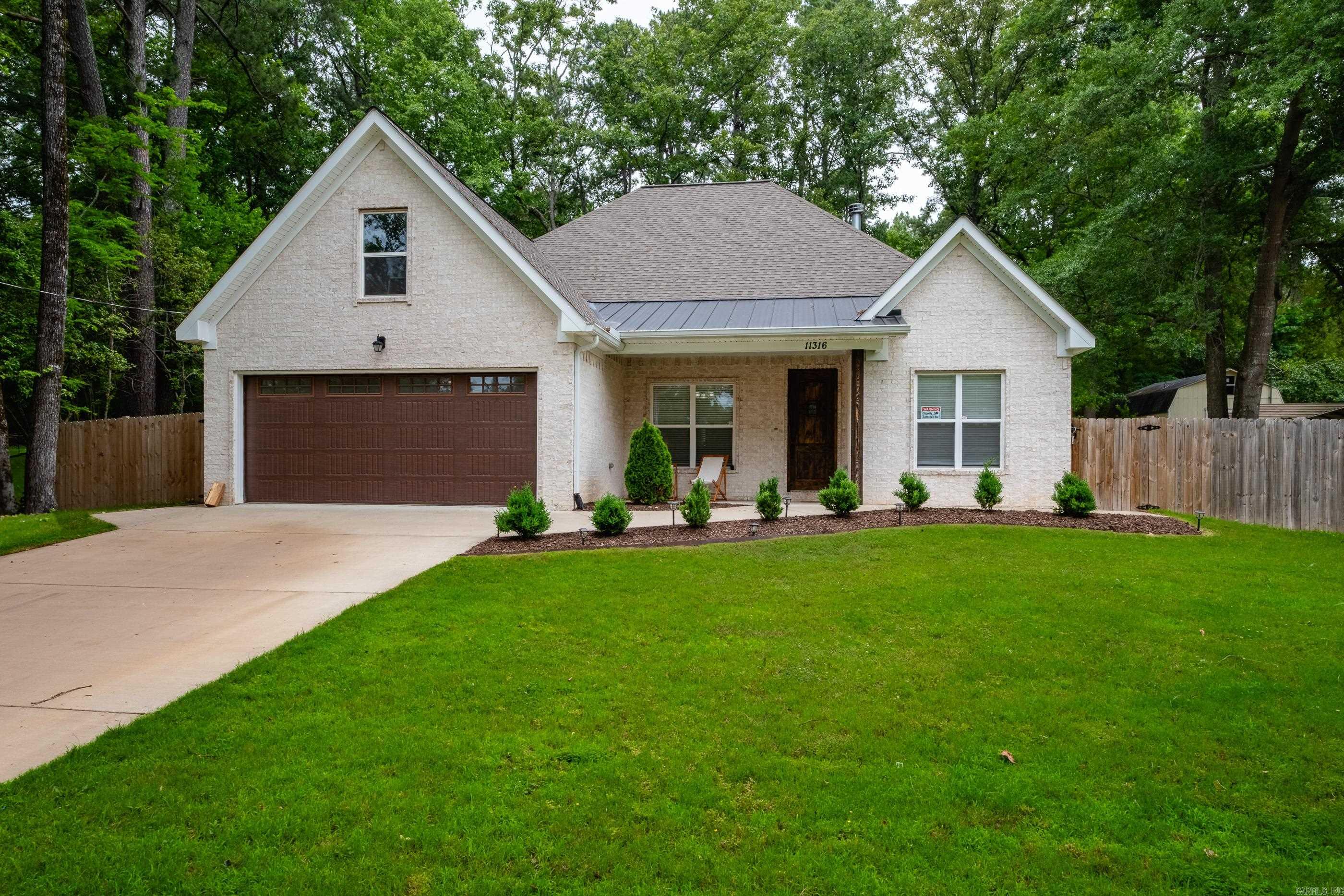 If you're looking for space, country living and everything new, then this is your new home! All new quartz counters, all new flooring and all new shower and tub surround in all bathrooms! New paint throughout and new kitchen backsplash! Lives like a one level, with only the bonus/bedroom and bath upstairs. Could be a 4 bedroom + office or 5 bedroom. Enjoy the huge kitchen, open floor plan with lots of versatility and large covered back porch for entertaining. Fully fenced backyard on half an acre. Located right down the road from Pinnacle Mountain, mountain bike trails and on the pinnacle loop trails! Close to everything and you also are able to appreciate the country life!