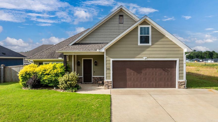 This bungalow inspired 4 bedroom stunner in Bryant has all the modern amenities you’ll love.   Walk into your large open floor plan with tall brick fireplace.  Your open kitchen has granite countertops, stainless steel appliances, and ample cabinet space.  Your privately set apart large primary bedroom has a spacious bathroom with double vanity and a tiled and seated walk in shower.  You also have your own private toilet closet and a connected walk in closet.    On the opposite side of the living space are your two guest bedrooms with guest bathroom.  Head upstairs and you'll find your 4th bedroom or bonus/media room with its own AC control.  From there you also have walk out attic storage space.    Step outside and enjoy your fully fenced backyard with a screened in covered porch and additional concrete patio.    Don't miss the 220 volt hot tub hook up on the back patio for the potential to relax in your own backyard.    We're excited for you to come and see if it's yours!