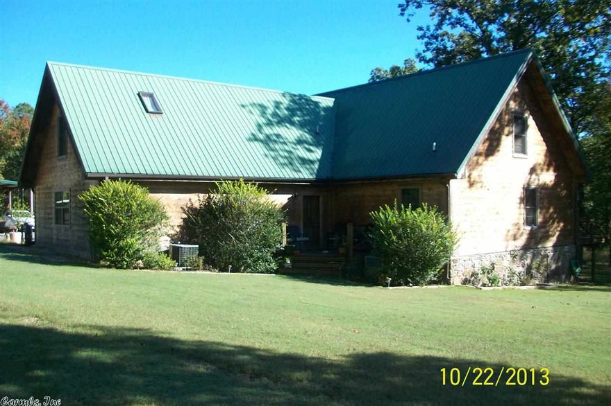 The deal of the century!!!! You get a beautiful home with a boat slip. This wonderful house has 3/4" hardwood floors, 2x6 pear and beam, hickory cabinets, vaulted wood ceilings, Large site built rock fireplace, attached 2 car garage. 5 awesome acres to enjoy four-wheeling or any of your outdoor activities. 30 X 50 Shop with electric & water. Minutes to your boat slip.  Don't take my word for it, come on down & out check this fantastic, amazing, spectacular home!!!