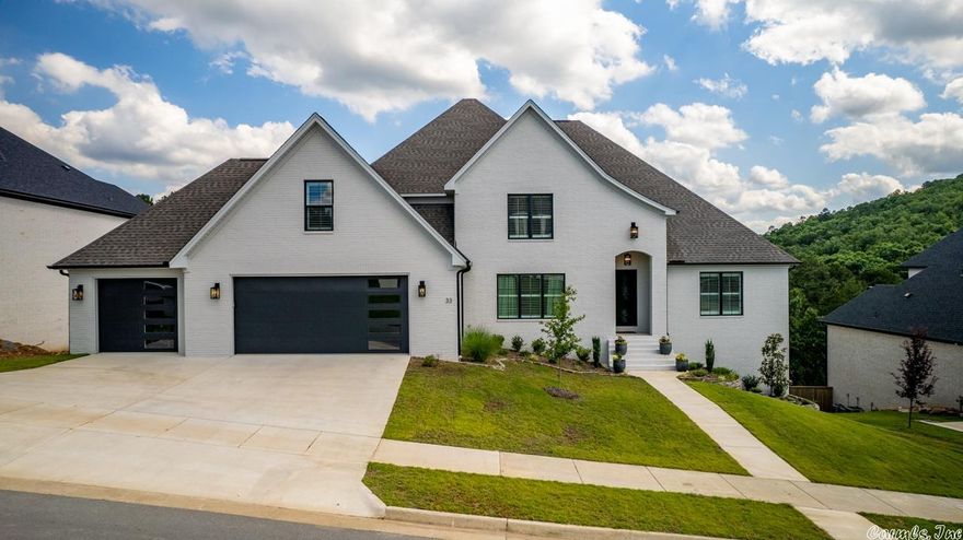 WOW - Rare opportunity for like new construction in Chenal Valley's Falstone Court. Custom built home in 2021 w/incredible views in the front & back. Beautiful plantation shutters. Main level has large primary suite w/oversized closet & spa-like bath, a 2nd guest suite w/bath, separate office, half bath, amazing kitchen that boasts a huge walk-in-pantry, laundry, walk-out porch w/fireplace. Upstairs has two bedrooms, two full baths & a bonus room complete w/kitchenette. Agents, see remarks for more info.