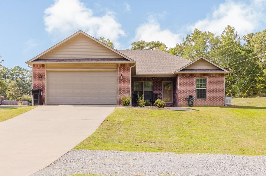 Well-maintained 3 bedroom, 2 bathroom home situated on nearly 2 acres in Bauxite! This property features an inviting open floor plan, a 30x40x12 shop with electricity, a safe room, and a home generator for added peace of mind. The spacious layout offers both comfort and functionality, with ample room for entertaining or everyday living. Enjoy a nice covered patio that overlooks the large backyard. Schedule your showing today!