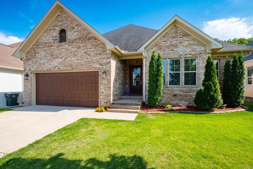 Stunning one-level brick home featuring an open, airy floor plan designed for both everyday living and effortless entertaining. This beautifully appointed 4-bedroom, 2.5-bath home showcases 6.5" hickory hardwood floors, soaring 10' ceilings, 8' doors, and abundant storage throughout.  The chef’s kitchen is a true centerpiece, complete with granite countertops, GE Profile stainless steel appliances, gas cooktop, pot filler, under-cabinet lighting, and an expansive island with breakfast bar seating.  The fully fenced private backyard features a covered patio.  Retreat to the oversized primary suite offering a spa-like bath with a freestanding tub, dual vanities, and separate his-and-her closets. A convenient Jack-and-Jill bath connects secondary bedrooms, while the fourth bedroom provides flexibility as a private office or guest space.  Additional highlights include an EV charging station, pre-wiring for security cameras, and generator readiness, adding both convenience and peace of mind. Washer, dryer, and refrigerator to convey.
