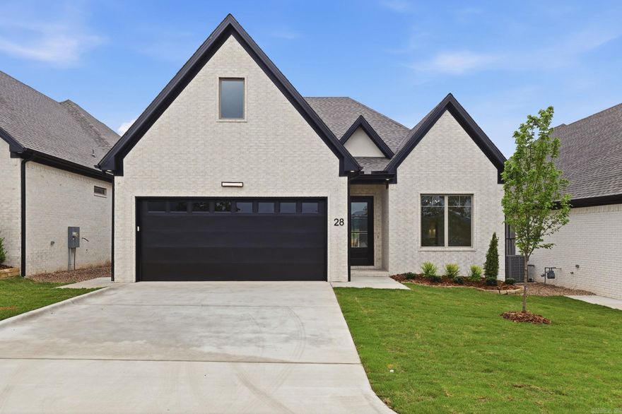 Welcome to Mountain Brook, West Little Rock's newest neighborhood, conveniently located off Highway 10 behind The Ranch. This single-level residence beautifully combines craftsmanship and design, featuring three bedrooms and two baths. The primary suite serves as a sanctuary with a spa-like bath, soaking tub, oversized walk-in shower, and a custom closet. The living room boasts soaring 12' ceilings and a floor-to-ceiling tiled fireplace. At the heart of the home is a chef’s kitchen equipped with quartz countertops, custom cabinetry, a dining area, and a fully functional pantry. You can also enjoy evenings by the outdoor fireplace.  Please contact the listing agent to schedule your private tour.