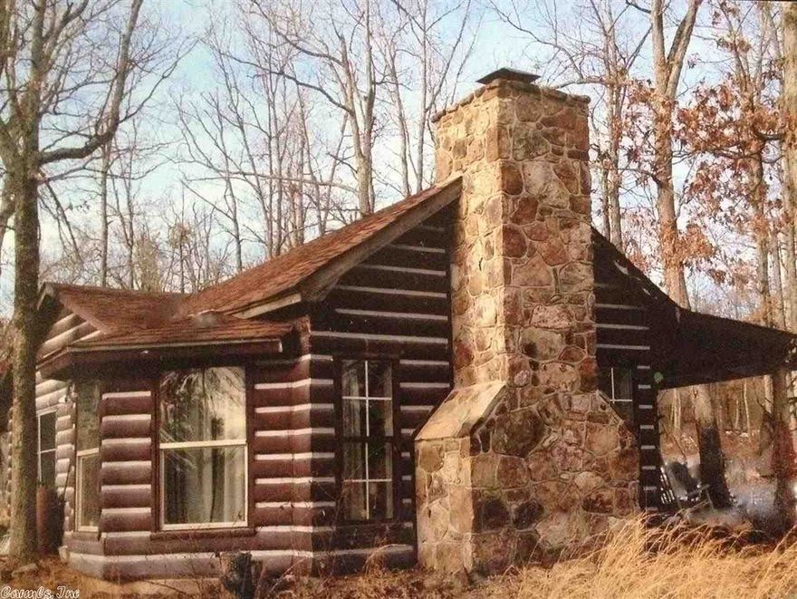 This home located on apx 88 acres is a perfect setting for a hunting cabin. Step out your back door and hunt for deer, turkey, squirrel or rabbits. Return  to your cabin and warm your toes by the all natural stone fireplace. The home has an open kitchen, dining and sleeping area. Lots of shade trees around the home and a large shop with front and back garage door opening. This home sits off the road, quiet and secluded. A short drive into Mountain View to enjoy the shopping and the  music on the square.