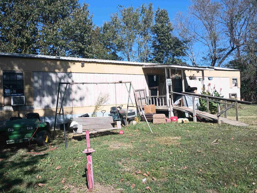 Older model home with 2BR, 1BA located between Paragould & Jonesboro. Situated on 1.25 Acres (m/l). Hwy Dept will be acquiring footage off highway frontage in the future. Occupied by long term tenant. Rents for $400 a month. SEE AGENT REMARKS.