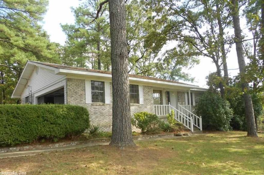 Remarkably clean, one owner gem is a stones throw to Hwy 10 on 1 acre lot!  Pretty original wood floors, spacious den and living room, breakfast bar, large laundry room, basement that could easily be finished out, covered patio area, huge outdoor storage building, new HVAC in 2011 and more!