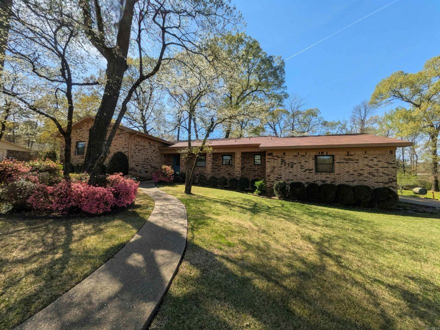 This beautifully maintained 3 BR/2.5 BA brick home offers comfort, space, & quality. Featuring a combo of tile & wood flooring, the home welcomes you into an open dining/family room w/ a cozy fireplace. The kitchen features Silestone countertops, backsplash, ample cabinetry, & a cozy breakfast area that overlooks the living space. Off the kitchen, the mud room provides a half bath & storage closet. Designed with efficiency in mind, the home includes 2 water heaters – a 40-gal. electric unit (2014) & a tankless system. All bedrooms are generously sized w/ double closets, with the primary suite (16’x18’) offering a sitting area & walk-in closets. The hall bath features tile flooring & a double vanity. The primary bath is a private retreat w/ a walk-in shower, soaking tub, & vanity space. Outside, enjoy the fenced backyard w/ a flagstone patio – perfect for entertaining & relaxing. Additional features include central H&A (2012), pier & beam foundation, 6” walls, & a sprinkler system. The garage offers plenty of parking room & a spacious storage room w/ both interior & exterior access. Pella windows & a newer roof (2021) add even more value to this attractive home. Don't miss out!