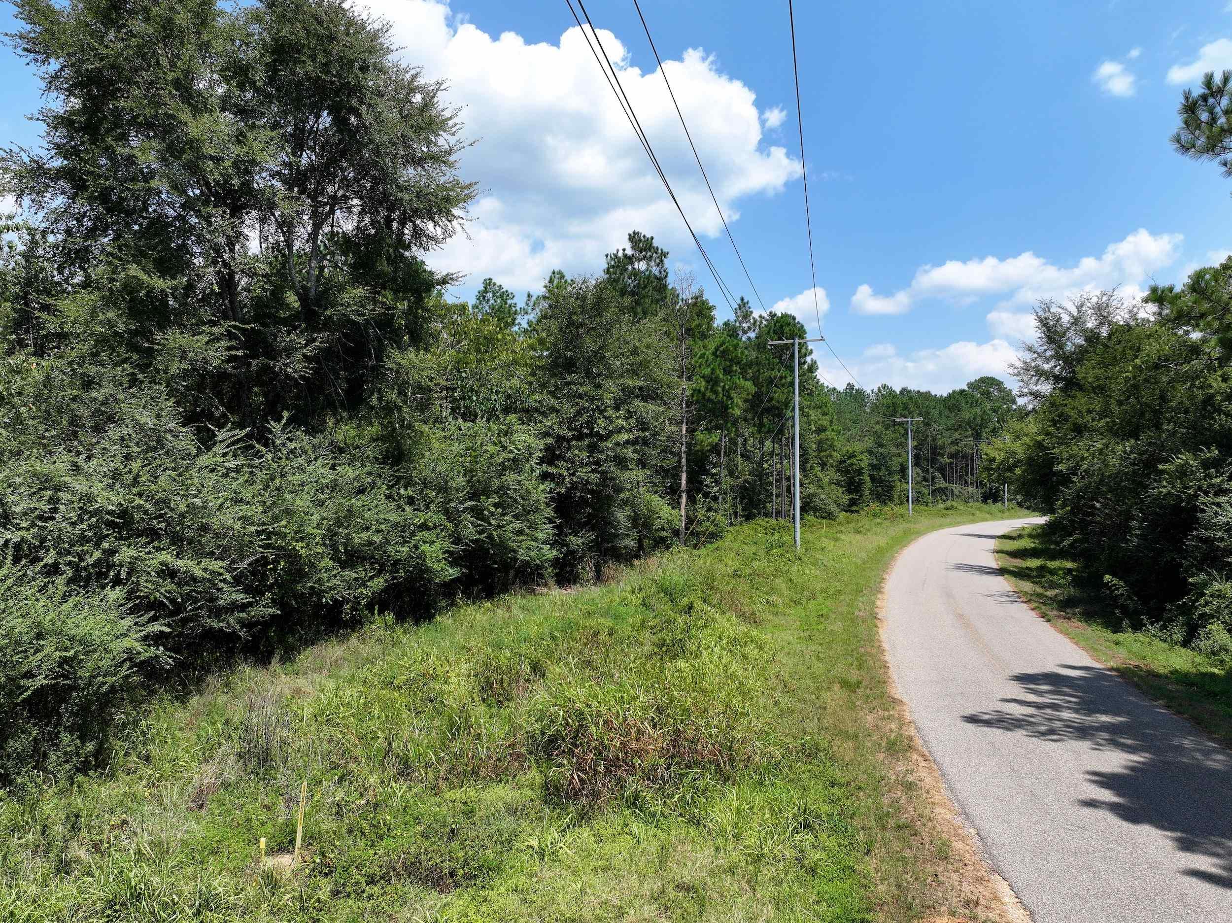 Discover the perfect blend of seclusion and convenience with this beautiful 20± acre property located on paved Kadoha Road, just outside the city limits of Murfreesboro. While bordering the city, this tract offers the atmosphere of rural livingāwithout sacrificing access to modern amenities. The land has been selectively thinned, preserving the natural timber while opening up ideal homesites. Utilities are available at the road, making this an excellent spot to build your dream home, a cozy weekend cabin, or a recreational retreat. Nature lovers and adventure seekers will love the proximity to local attractions including the Little Missouri River, Crater of Diamonds State Park, Lake Greeson, and the historic Kadoha Indian Village. For added flexibility, the property is listed three ways in the MLSāavailable as two 10± acre tracts or the full 20± acres. MLS #'s 25031122 &25031123 Donāt miss this rare opportunity to own a slice of Arkansas paradiseāserene, scenic, and perfectly located.