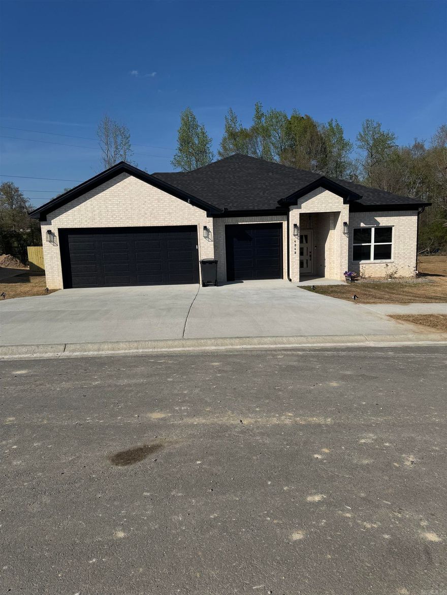 New Construction! All brick exterior. Large picture windows. The backyard is bordered by green space. Energy efficient windows, doors, and foam insulation. Laundry room and pantry.