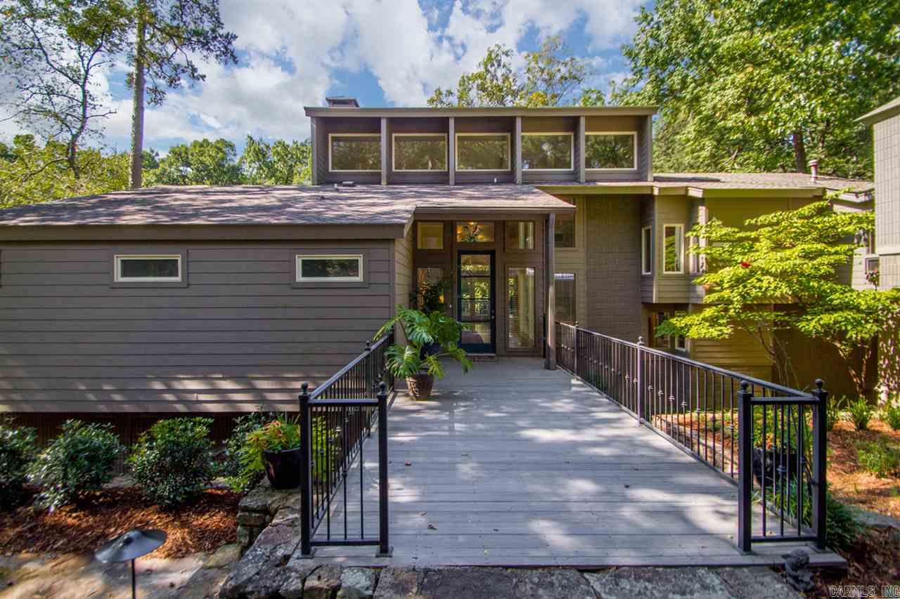 Stunning contemporary with extraordinary floor plan! Beautiful light filled home that offers the perfect setting for family living and phenomenal entertaining indoors & out! Gourmet kitchen with large center island flows into living & dining. Large great room w/two story ceiling and wall of windows overlooking outdoor terrace & half acre lot with greenbelt. Updated mst suite on main level. Sep. loft office/study. Lower level: Lrg playrm/media, Guest suite w/full bath along w/ 3 addit. large bedrms and bath.