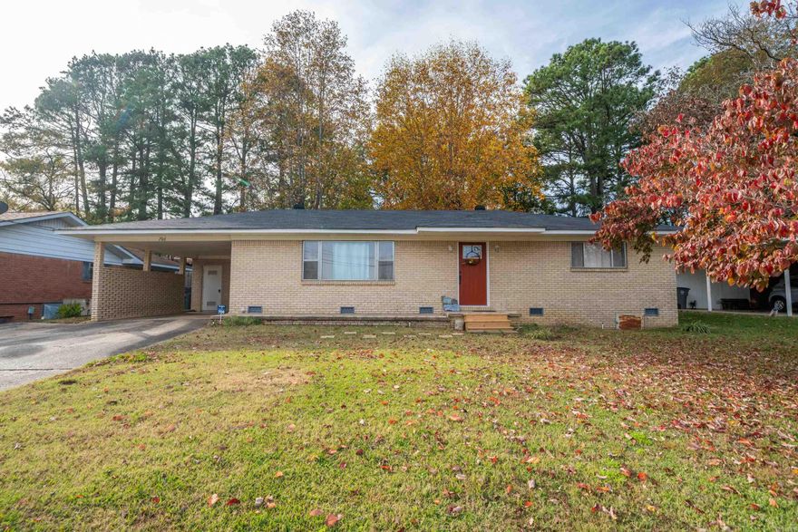 Situated in the vibrant heart of Hot Springs, this meticulous 2-bedroom, 1.5-bath brick home exudes character and convenience. Originally the "McClard' family home, you'll love the vintage charm inside - including the original oven & stove (still fully-functional), and darling retro tiles in both baths. Updated luxury vinyl flooring graces the main living areas, and the bonus room would make a perfect 3rd bedroom, family room, or office. You'll appreciate the new HVAC system (installed in 2020), along with the whole-home generator, ensuring year-round comfort. A hidden gem awaits beyond the back door—an expansive fenced back yard, providing a private haven for relaxation, gardening, and outdoor gatherings. This is where modern comfort meets classic charm...what a perfect place to call "Home"!