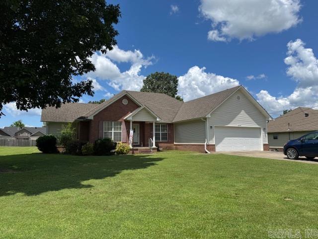 GREAT PRICE & GREAT NEIGHBORHOOD!! This 1941 square foot home has 3 bedrooms and 2 bathrooms, huge living room, kitchen/dining combo and laundry room. Master suite with new walk-in shower, walk-in closet and jetted tub. Kitchen with island bar w/electric, new microwave/vent a hood and pantry. Large dining area overlooking the big back yard! Laundry room with cabinets. Living room has built ins on each side of the gas log fireplace w/mantle. Other features include vaulted ceilings, tray ceilings, lots of storage, 2 walk-in closets, 2016 water heater, 2017 electric central heat and air and a 2024 Generac Generator. 2 car garage with ventless heater. 2 storage buildings, 10X18 and a 16X20 with electric and window air conditioning. Nice level .40 of an acre lot. Close to schools, hospital and shopping! Paved road in a great neighborhood!