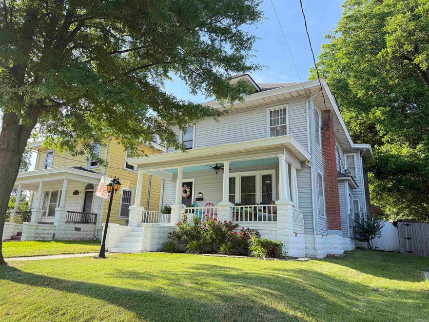Charming historic home with modern upgrades! Step into timeless elegance with this beautifully renovated 5 bedroom 2 bath historic home in the heart of Paragould. This home has been thoroughly updated while preserving it's classic character. Enjoy NEW stainless steel appliances, water heater, two central heat and air units, and roof. The home shines with refinished original hardwood floors, fresh paint throughout, new lighting, fans and chandeliers that bring modern sophistication while original doors and refinished knobs keep the historic charm. With over 2264 sq ft of living space, there is plenty of space to enjoy.  There is also a large floored attic and basement area for additional storage or expansion!  There is deeded access to the back of the property and a two car carport for easy access. This one-of-a kind home is move in ready and waiting for it's next chapter!