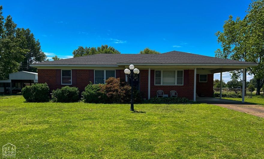 Discover your perfect slice of small-town living with this delightful 3-bedroom, 2-bathroom home at 1038 Midway Rd, nestled in the heart of Hoxie, Arkansas. Spanning approximately 1,296 square feet, this cozy residence offers a blend of comfort and potential, ideal for first-time buyers, families, or investors looking for a promising opportunity. Step inside to find a warm and inviting layout featuring a spacious living area filled with natural light, perfect for relaxing or entertaining. The kitchen offers ample cabinetry and counter space, ready for your personal touch to make it a culinary haven. The three generously sized bedrooms provide plenty of room for rest or a home office. Outside, the property sits on a well-proportioned lot, offering a large backyard with endless possibilities think gardening, playtime, or future expansions. A concrete driveway leads to a carport, providing covered parking and added convenience. Located in the Hoxie School District, this home is just minutes from local schools, shops, and amenities, including the popular Midway Donut for a morning treat.  Priced competitively, Whether you're looking to settle down or invest