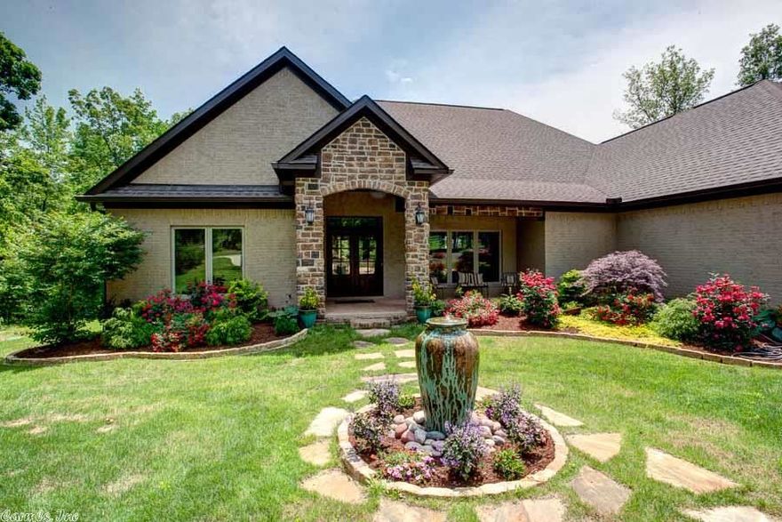 Custom built home loaded with amenities in immaculate condition. Very open floor plan. Sits on 3 acres with gorgeous views. Lives like a one level with 3 bed/2.5 baths on main level. 2nd level is a huge room with lots of storage. Great for game or play room. Gourmet kitchen with energy efficient appliances. Energy Home Masters Trane HVAC. Large covered patio includes a screened in porch. Central vac, sprinkler system, alarm, professional sound system in/out.  TONS of storage. 3 car side loading garage.