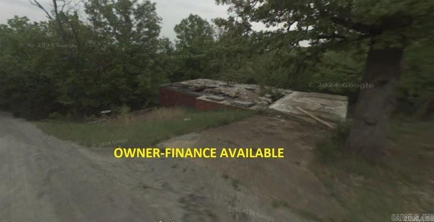 Owner-finance for easy terms. Stellar deal on a partially developed home! Concrete is poured for the driveway and garage. Crawlspace brick foundation already set up. Utilities may be present as well and to be verified by the buyer. The work that has already been done and remains of previous home is worth well over 70k in development savings. Cash or finance buyers can pay by debit or credit card as well. Nice size lot as well. Owner/agent. Finance is an extra $400 with no interest or prepayment penalty. 12 months at $650 and closing costs are included. Buyer responsible for any/all taxes and lot sold "as-is". Parcel ID# 306-00419-000
