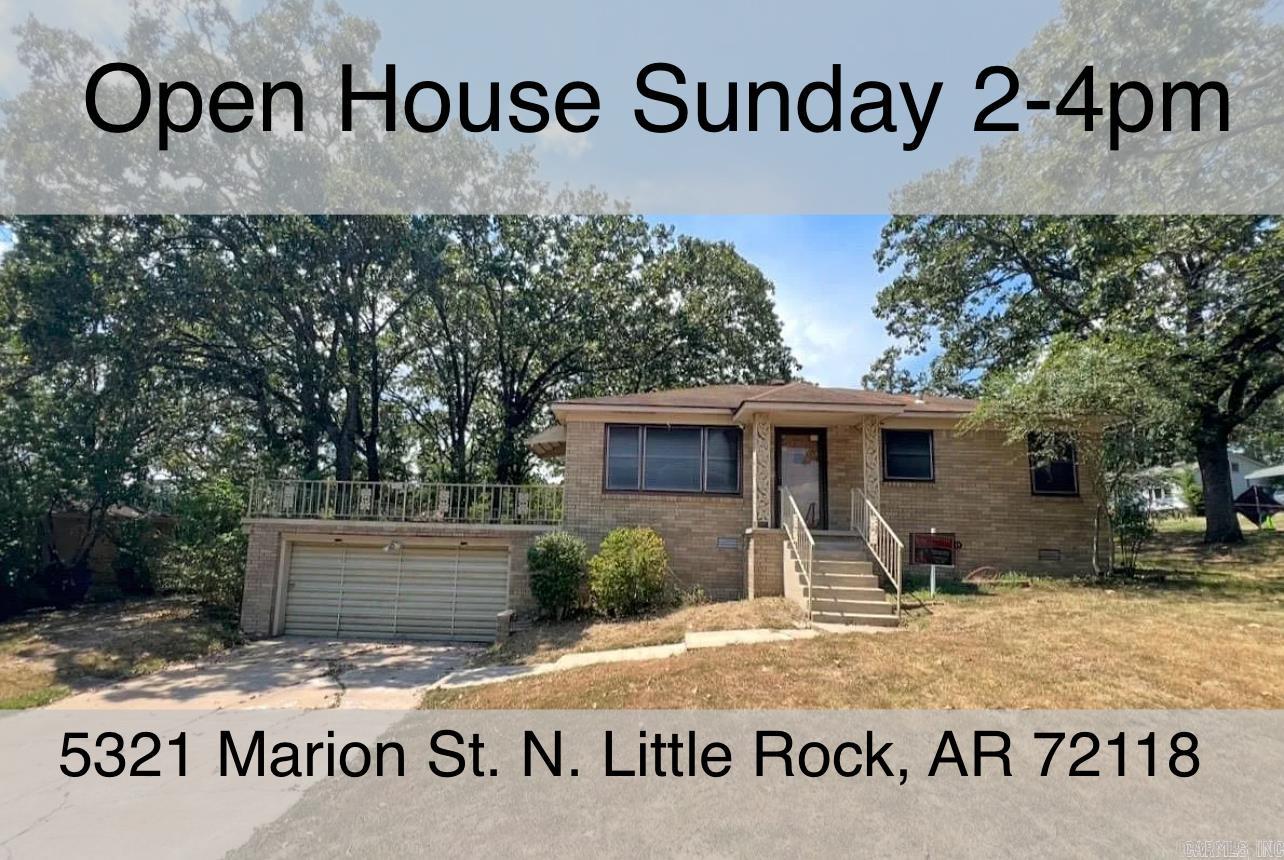 OPEN HOUSE SUNDAY! 5321 Marion Street. Discover this all brick single family home, full of curb appeal on a corner lot! Step through the stunning front door that sets the tone for the warm and inviting interior! Featuring original wood floors throughout, this 3 bed, 1 bath home offers cozy living spaces with all new interior lighting. Step outside and enjoy the unique patio above the 2 car garage, perfect for relaxing or entertaining. Fully fenced backyard is shaded by mature trees. Low Maintenance! New Air Duct System 2024, Water Heater 2025, New HVAC 2021. Exterior has been power washed to look like new! OPEN HOUSE SUNDAY 2-4pm Don't miss out on this charming all-brick home! VIDEO TOUR AVAILABLE: https://tinyurl.com/bxn24k6a