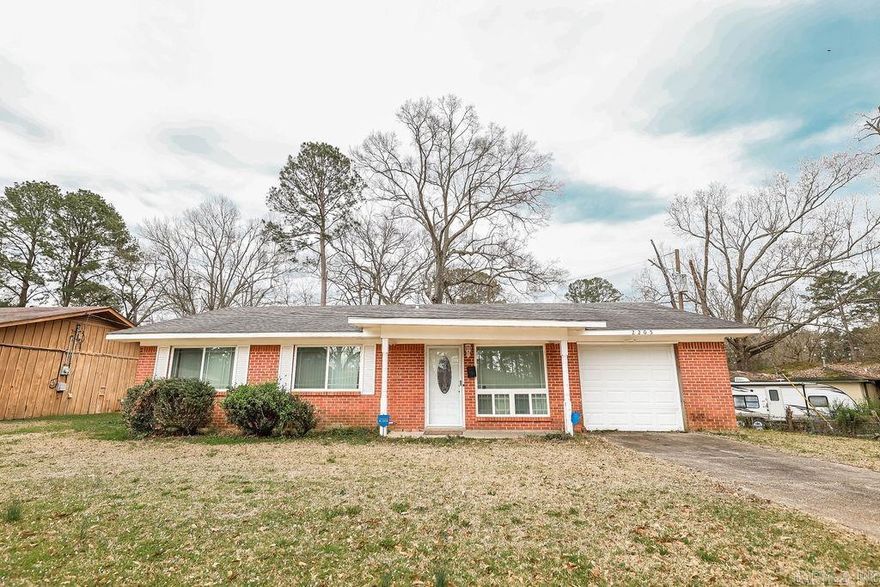 Welcome to this charming property at 2205 Lakeland.  This 3 bedroom, 2 bath home is updated throughout.  Enjoy the fresh paint and new flooring.  The new windows allows natural light to enter.  The modern kitchen has stainless steel appliances and ample cabinet space.  Master bedroom is complete with en-suite bathroom.