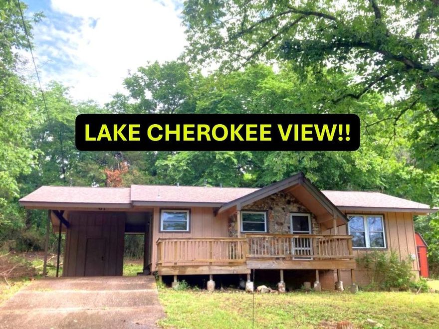QUICK OCCUPANCY WITH LAKE CHEROKEE VIEWS!! A Must-See, 3 Bedroom 1 1/2 bath lakeview home just across the road from beautiful Lake Cherokee in Cherokee Village AR. This home has had updated flooring & windows along with an architectural shingled roof. The kitchen has had custom built cabinets and countertops to expand the counter space and utilize the spacious eat-in kitchen. Spend your mornings enjoying your coffee on the partially covered front deck while enjoying those Lake Cherokee views. The large living room also has a big double window to enjoy those lake views. This home blends comfort, updates, and a peaceful lakeview setting. With flexible bedroom space and a bright, open living area, it’s well-suited for full-time living, a vacation home, or a rental investment. #2430