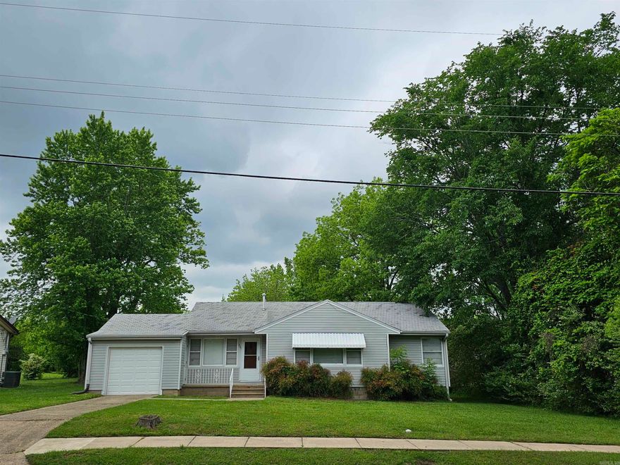 Very charming home located inside the city limits of Mena, AR.  Beautiful large shade trees, level lot with driveways in the front and back.  Built-ins in the dining room and living room, newly remodeled kitchen and bathroom. Located within walking distance of Janssen Park.  There are 3 lots totaling 1 acre (more or less).  Agents see remarks.