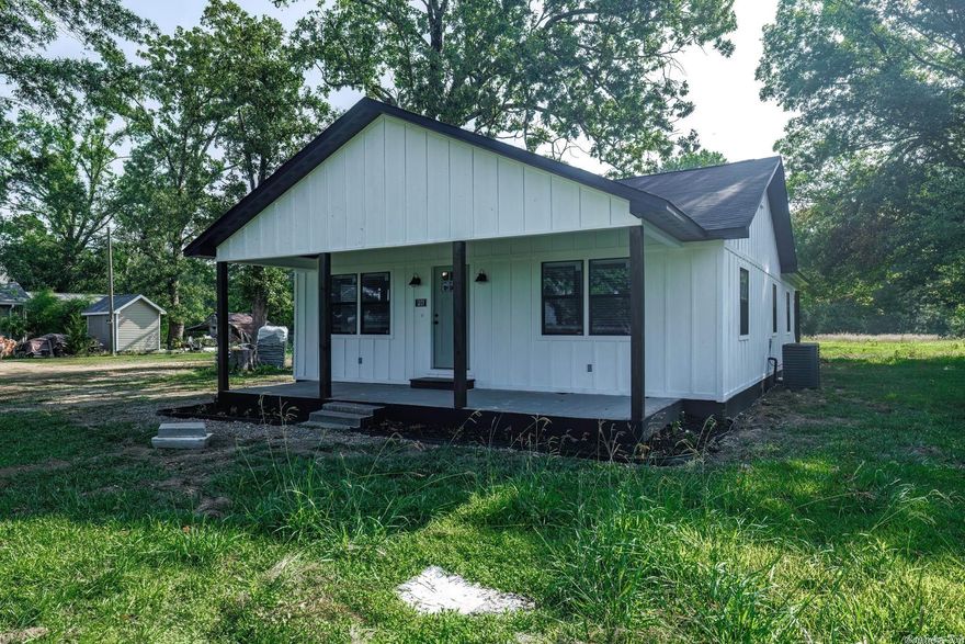 Welcome to this stunningly remodeled 3 bedroom, 2 bath home situated on a generous 3-acre lot. Nestled in a serene, rural location, this property offers a peaceful retreat from the bustling city life. Step inside and immediately be captivated by the modern upgrades and attention to detail. The open concept kitchen, adorned with exquisite granite counters, creates a perfect space for culinary adventures while interacting with friends and family in the adjacent living areas. The abundant natural light floods the space, highlighting the beauty of the renovation. The master suite is a true oasis, featuring a huge walk-in shower that boasts both style and functionality. The spa-like atmosphere invites you to relax and unwind after a long day. The two additional bedrooms are generously sized and offer plenty of room for personalization, the expansive 3-acre lot offers endless possibilities - from gardening to outdoor activities. Imagine having your own private retreat, perfect for entertaining, relaxing, and enjoying the serene surroundings. W its idyllic countryside setting and modern upgrades, this completely remodeled home truly offers the best of both worlds.