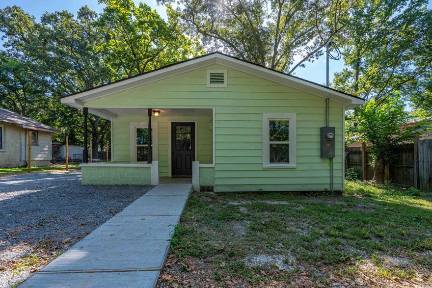 Charming Fully Remodeled 2 Bed, 2 Bath Home!  Step into comfort and style with this beautifully remodeled home featuring a spacious primary suite complete with two closets and a linen closet. The kitchen boasts granite countertops and custom wood cabinetry, offering both elegance and functionality. Enjoy peace of mind with an on-site storm shelter, and take advantage of the adorable storage building in the backyard for all your extra needs. This move-in ready home blends modern updates with thoughtful touches throughout—don’t miss it! AGENTS See remarks