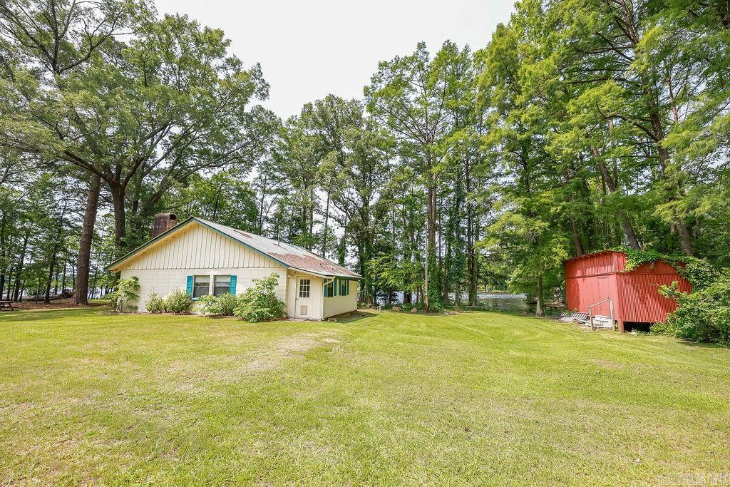 Charming, 2 bed, 1 bath, lake front home on beautiful Calion Lake - this property features an open floor plan with great natural light, sweeping lake views, and easy access to your own private dock. Whether you're looking for a weekend retreat or a cozy full-time home, this property offers peace, comfort and the perfect lakeside lifestyle.