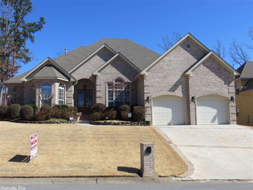 Beautifully detailed with exceptional quality and layout. Master suite, plus two guest rooms downstairs with Jack and Jill bath between the  guest rooms. Two living areas, office, and formal dining down as well. Upstairs hosts a bonus room or 4th bedroom with full bath. Spacious kitchen features granite countertops, gas cooktop, stainless steel appliances.  Extras include remote control blinds on front door and master bath. Newer carpet. Large closets, walk in attic space. Left side bordered by green space.