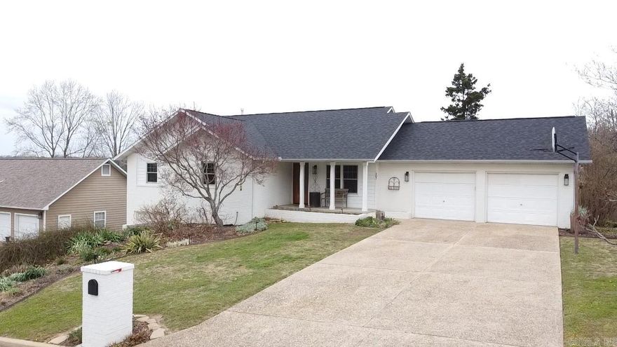 Beautifully updated 3-bedroom, 3 full bath home in a desirable Harrison neighborhood! Features include a 2-car garage on the main level plus an oversized 1-car garage in the basement—ideal for storage or workshop space. The inviting living area offers a cozy gas log fireplace. The home has seen numerous updates including newer windows, appliances, exterior siding and paint, roof, and tastefully renovated main and primary bathrooms—providing peace of mind and modern comfort. Enjoy the fenced backyard—perfect for pets or entertaining. Conveniently located just minutes from Harrison Country Club for dining, golf, and tennis. Approximately 35–40 minutes to Branson, 30 minutes to the Buffalo National River, and 30 minutes to Bull Shoals Lake. Move-in ready with comfort, updates, and a great location!